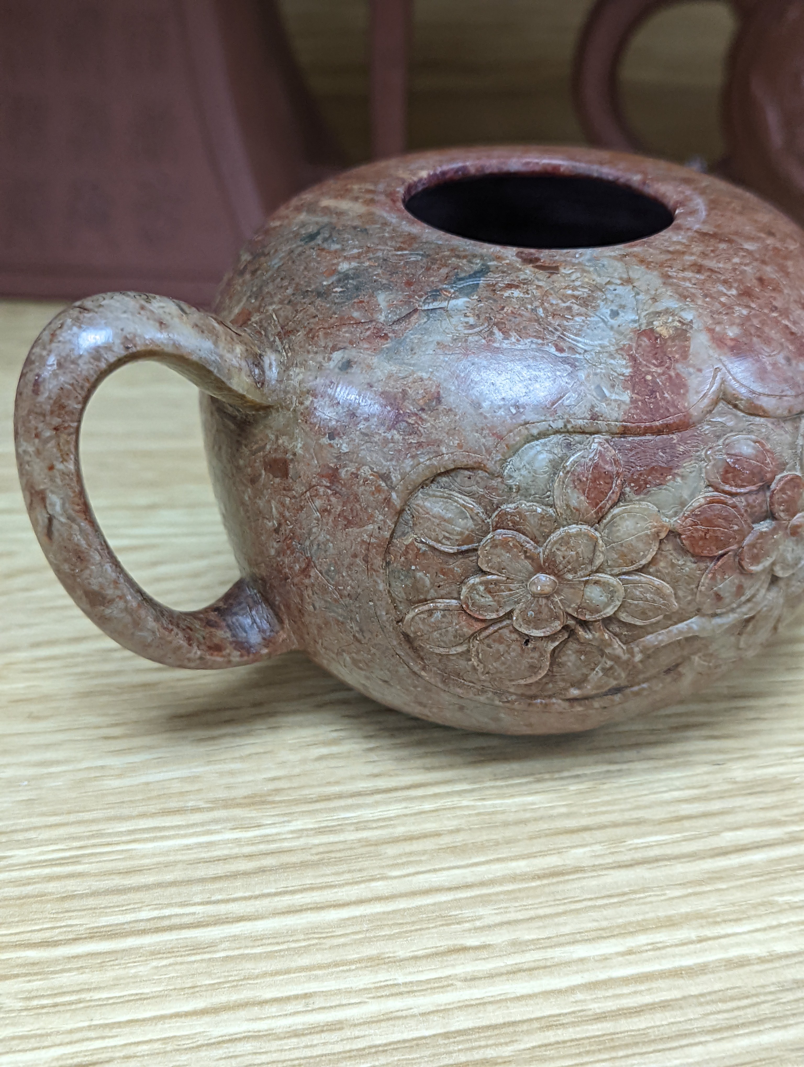 Three Chinese Yixing teapots and a carved soapstone teapot tallest 12cm